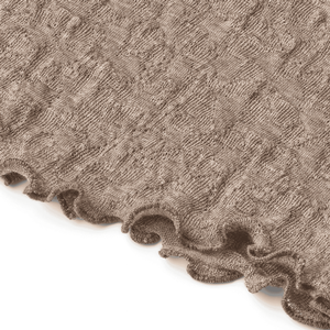 Detailaufnahme Jacquard-Muster des Jalfe Merino Riesenschals in Hellbraun