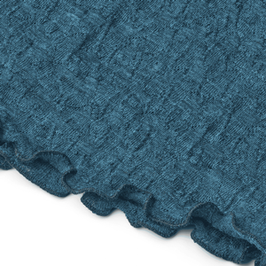 Detailaufnahme Jacquard-Muster des Jalfe Merino Riesenschals in Petrol